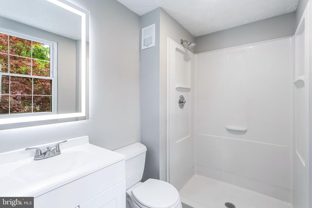 1240 Windmill Ln, Silver Spring, MD 20905 - bathroom with a shower, vanity, and a textured ceiling