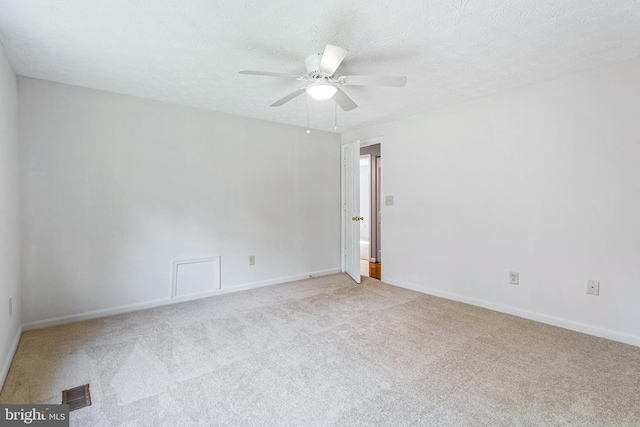 1240 Windmill Ln, Silver Spring, MD 20905 - unfurnished room with light colored carpet, a ceiling fan, and a textured ceiling