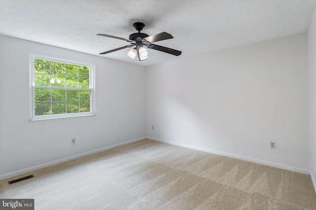 1240 Windmill Ln, Silver Spring, MD 20905 - carpeted spare room with a ceiling fan and a textured ceiling