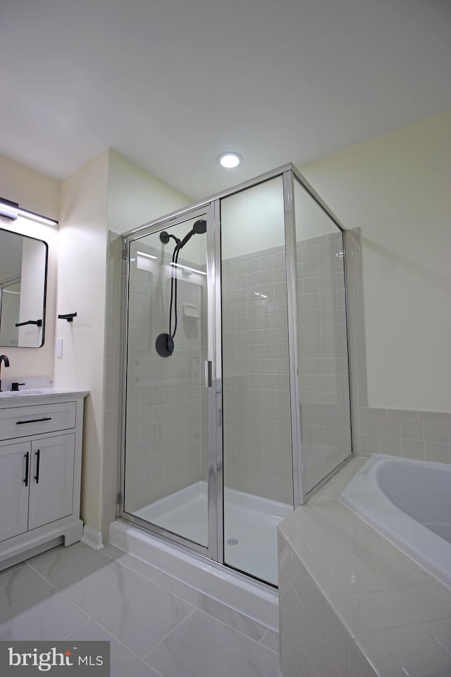 3655 Islington St, Frederick, MD 21704 - bathroom featuring a bath, vanity, a stall shower, and recessed lighting