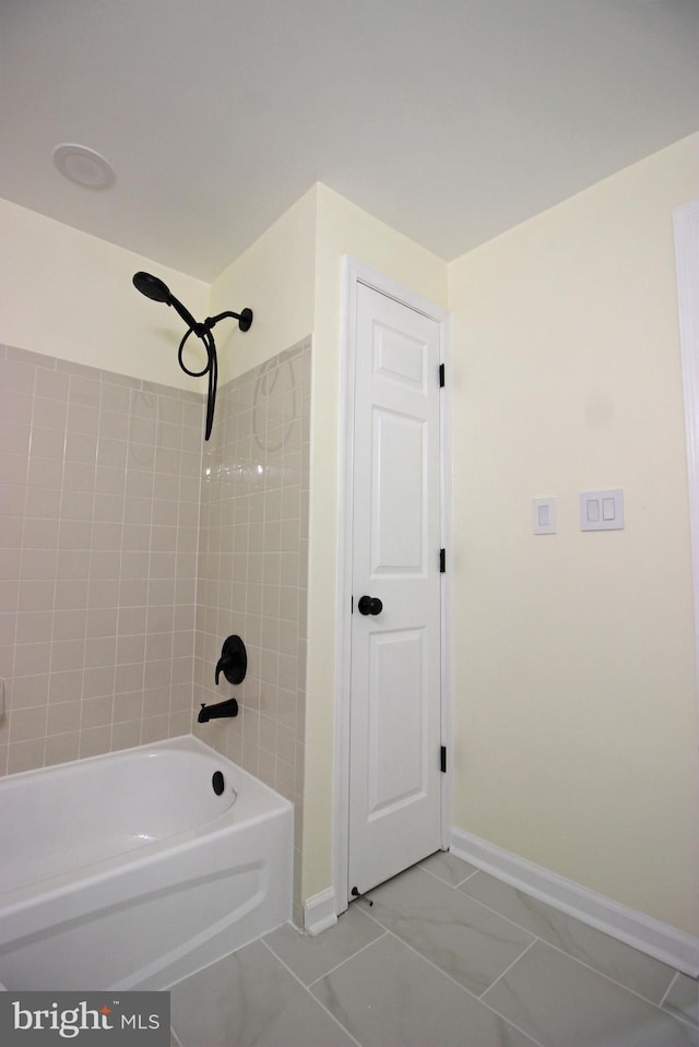 3655 Islington St, Frederick, MD 21704 - full bathroom with bathing tub / shower combination, baseboards, and marble finish flooring