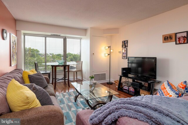 2001 Hamilton St Unit 925, Philadelphia, PA 19130 - living room with wood finished floors