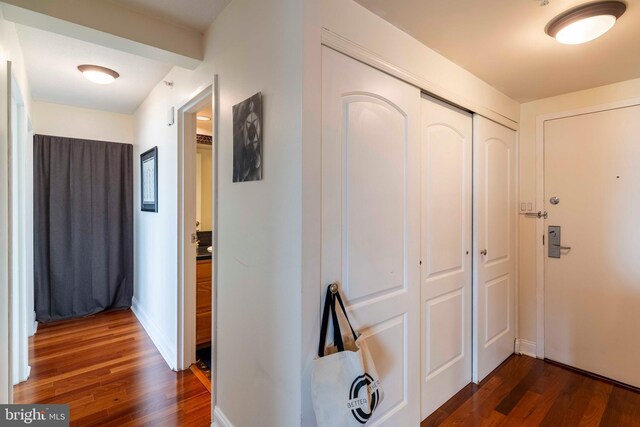 2001 Hamilton St Unit 925, Philadelphia, PA 19130 - corridor featuring dark wood-type flooring and baseboards