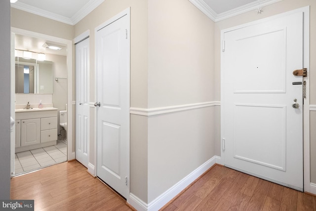 1901 John F Kennedy Blvd Unit 1414, Philadelphia, PA 19103 - corridor with light wood-style flooring and crown molding