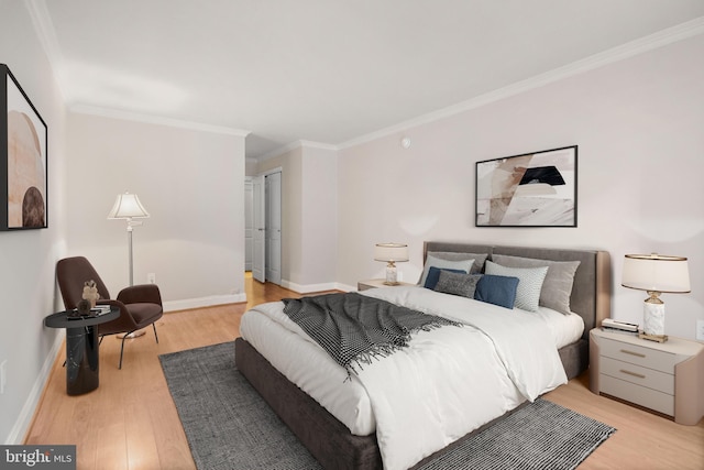 1901 John F Kennedy Blvd Unit 1414, Philadelphia, PA 19103 - bedroom with light wood-type flooring and ornamental molding