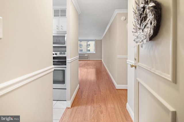 1901 John F Kennedy Blvd Unit 1414, Philadelphia, PA 19103 - corridor featuring crown molding, light wood-type flooring, and a wall unit AC