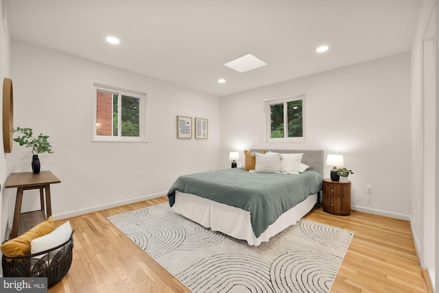 6232 18th Rd N, Arlington, VA 22205 - bedroom with a skylight, wood finished floors, multiple windows, and recessed lighting