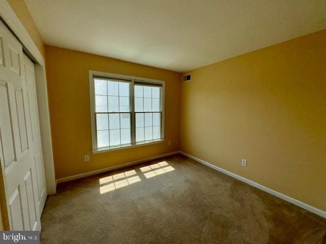 12410 Coastal Marsh Dr, Berlin, MD 21811 - spare room with baseboards and carpet floors