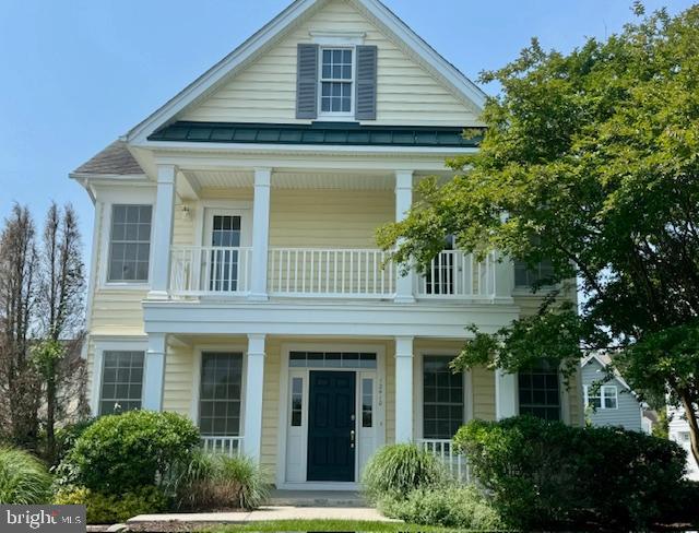 12410 Coastal Marsh Dr, Berlin, MD 21811 - neoclassical / greek revival house with a balcony and covered porch