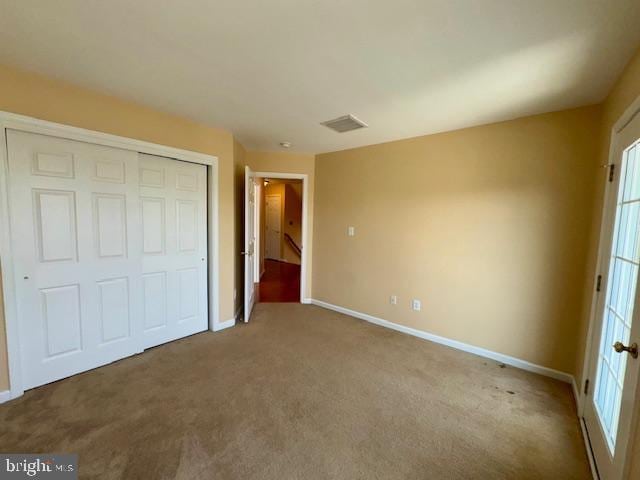 12410 Coastal Marsh Dr, Berlin, MD 21811 - unfurnished bedroom featuring carpet floors and a closet