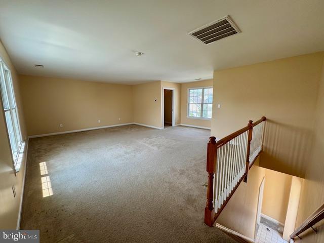 12410 Coastal Marsh Dr, Berlin, MD 21811 - carpeted empty room with baseboards