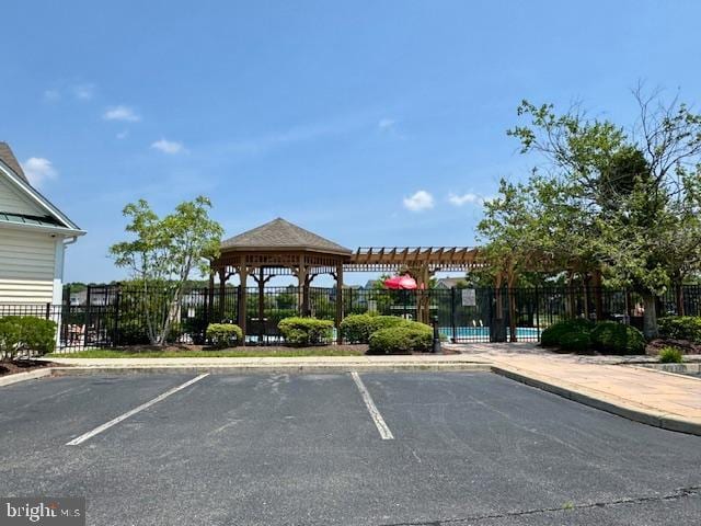 12410 Coastal Marsh Dr, Berlin, MD 21811 - uncovered parking lot with a gazebo