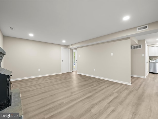 9124 Goldamber Garth, Columbia, MD 21045 - unfurnished living room with light wood-style floors and recessed lighting