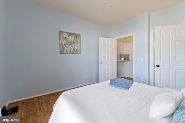 1581 Spring Gate Dr Unit 5309, Mclean, VA 22102 - bedroom featuring wood finished floors and baseboards