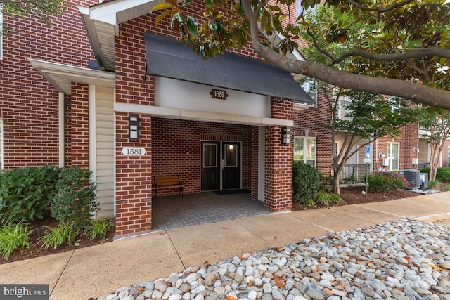 1581 Spring Gate Dr Unit 5309, Mclean, VA 22102 - view of exterior entry featuring brick siding