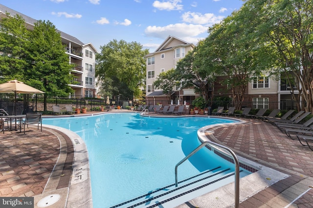1581 Spring Gate Dr Unit 5309, Mclean, VA 22102 - community pool featuring a patio