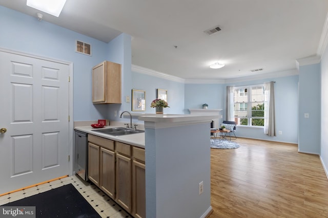 1581 Spring Gate Dr Unit 5309, Mclean, VA 22102 - kitchen with stainless steel dishwasher, crown molding, a peninsula, open floor plan, and light countertops