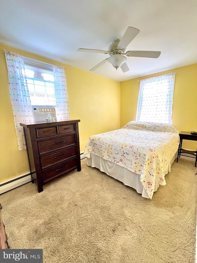 1838 Benson St, Philadelphia, PA 19152 - bedroom featuring carpet flooring, a baseboard heating unit, and a ceiling fan