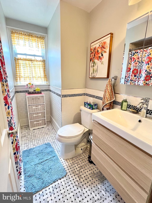 1838 Benson St, Philadelphia, PA 19152 - full bathroom with tile walls, vanity, and wainscoting