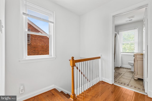 1928 Shepherd St NE, Washington, DC 20018 - hall featuring an upstairs landing and light wood-style flooring