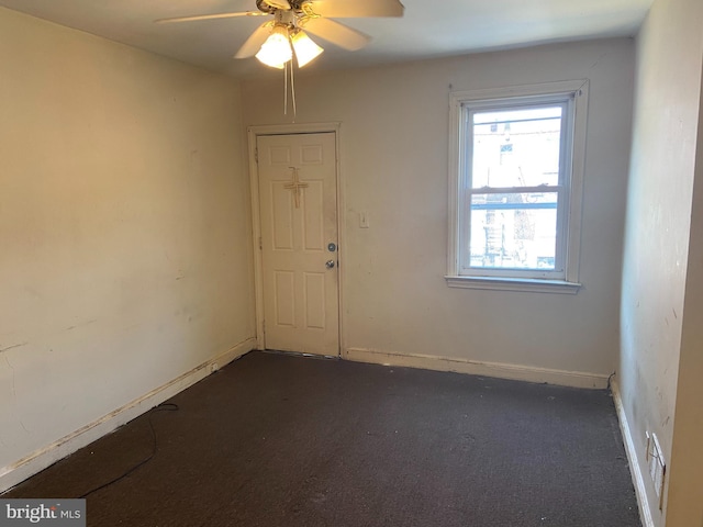2133 Seneca Rd, Wilmington, DE 19805 - unfurnished room featuring dark carpet and ceiling fan