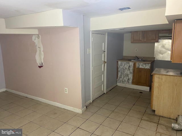 2133 Seneca Rd, Wilmington, DE 19805 - kitchen with a sink and light tile patterned flooring