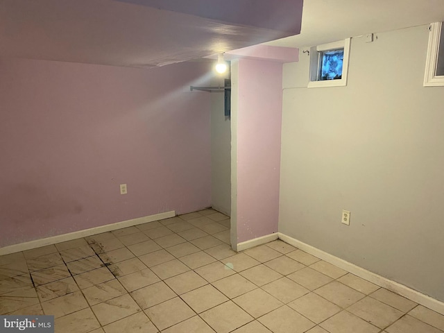 2133 Seneca Rd, Wilmington, DE 19805 - finished below grade area featuring light tile patterned floors and baseboards