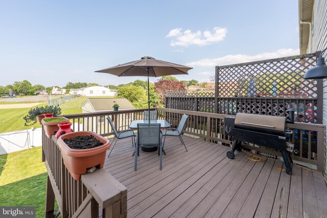 219 Flint Hill Rd, Alburtis, PA 18011 - wooden terrace featuring outdoor dining area and a lawn
