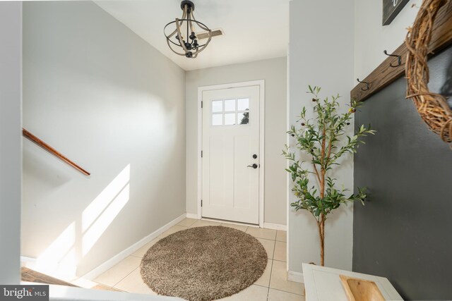 219 Flint Hill Rd, Alburtis, PA 18011 - foyer entrance featuring light tile patterned floors and a chandelier