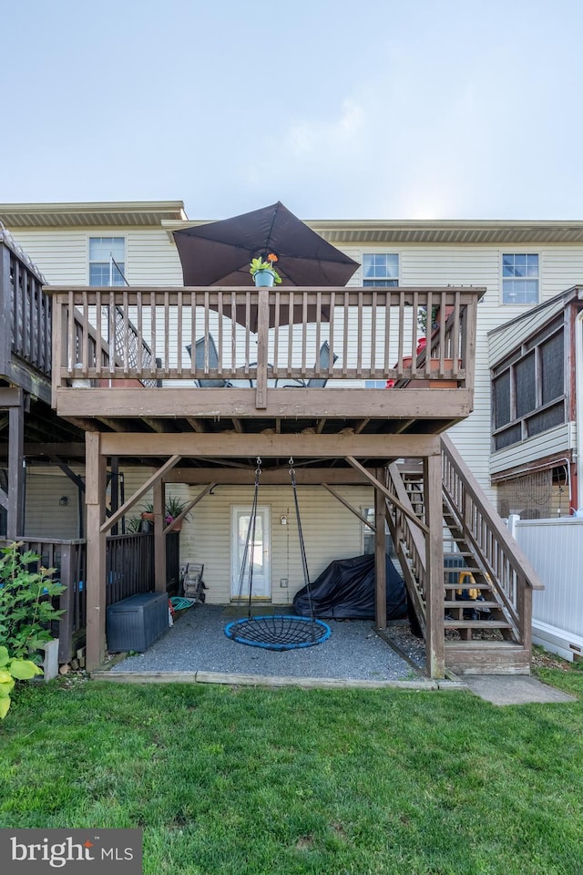 219 Flint Hill Rd, Alburtis, PA 18011 - rear view of property featuring a wooden deck, a lawn, and a patio