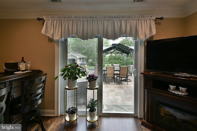 342 Glenn Ave, Lawrenceville, NJ 08648 - doorway to outside with ornamental molding and wood finished floors