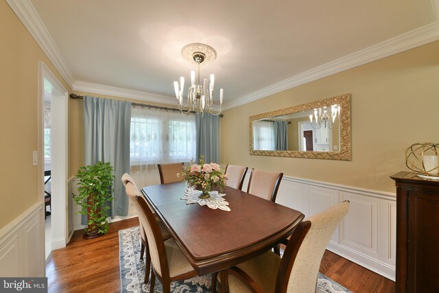 342 Glenn Ave, Lawrenceville, NJ 08648 - dining room with a chandelier, ornamental molding, wainscoting, wood finished floors, and a decorative wall
