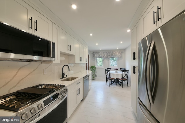 342 Glenn Ave, Lawrenceville, NJ 08648 - kitchen with stainless steel appliances, light stone countertops, white cabinetry, decorative backsplash, and recessed lighting
