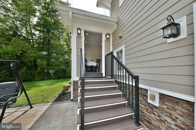 342 Glenn Ave, Lawrenceville, NJ 08648 - view of exterior entry with a yard and a patio area