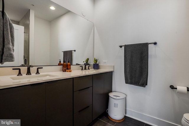 3509 Sutton Heights Cir, Fairfax, VA 22031 - bathroom with double vanity, tile patterned floors, and recessed lighting