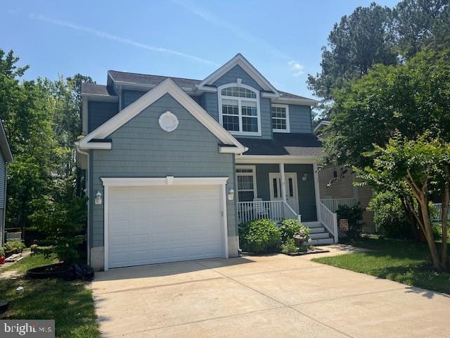 17 Alden Ct, Ocean Pines, MD 21811 - view of front of home featuring covered porch and concrete driveway