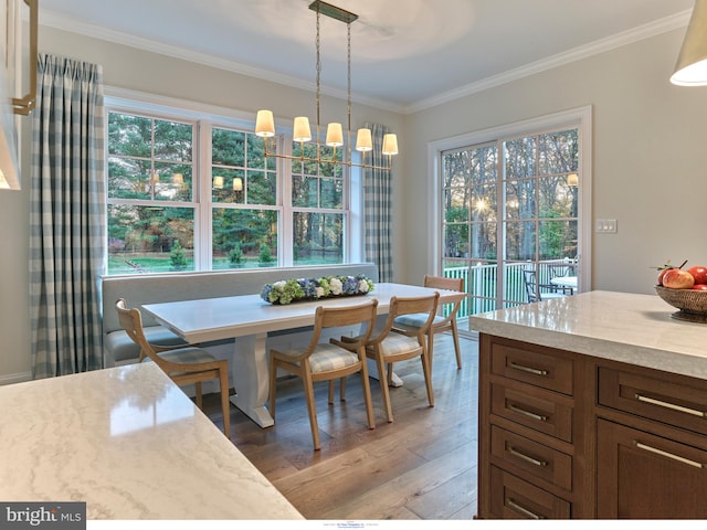 204 Walnut Tree Ln, Malvern, PA 19355 - dining space featuring light wood-type flooring, plenty of natural light, ornamental molding, and breakfast area