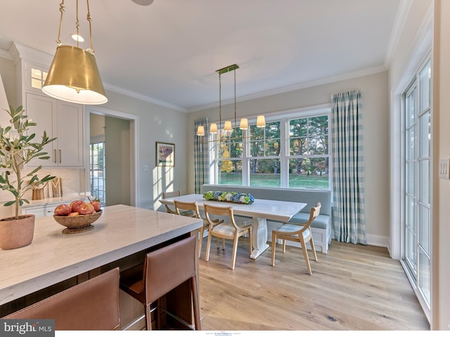 204 Walnut Tree Ln, Malvern, PA 19355 - dining area with breakfast area, light wood-style floors, plenty of natural light, and crown molding