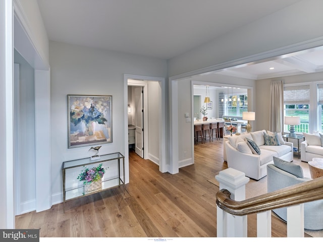 204 Walnut Tree Ln, Malvern, PA 19355 - living area with wood finished floors and beam ceiling