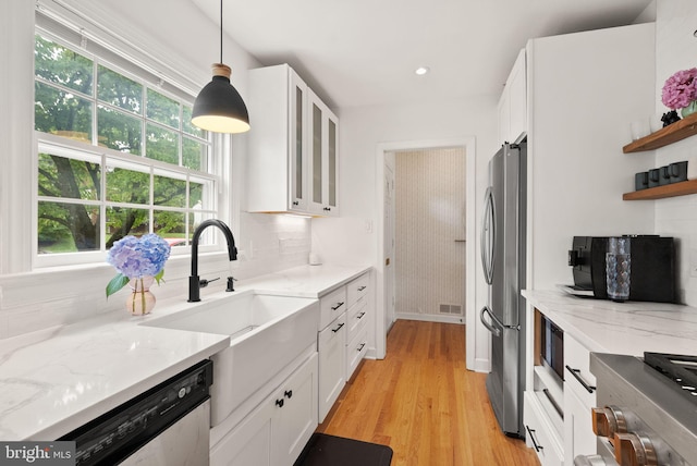 6018 25th Rd N, Arlington, VA 22207 - kitchen featuring stainless steel appliances, white cabinetry, healthy amount of natural light, and recessed lighting