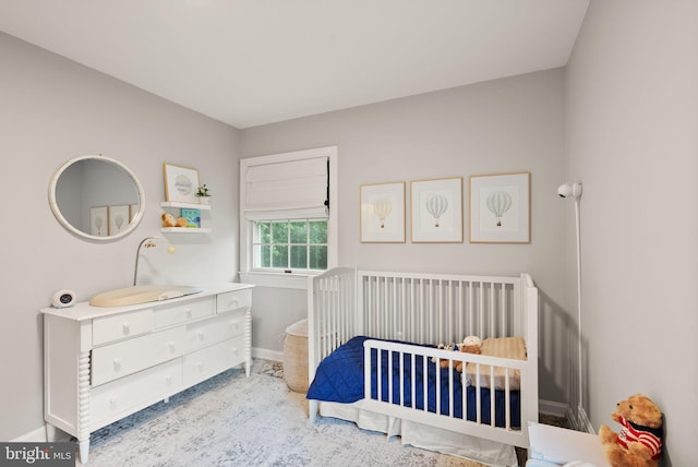 6018 25th Rd N, Arlington, VA 22207 - bedroom with a crib and baseboards