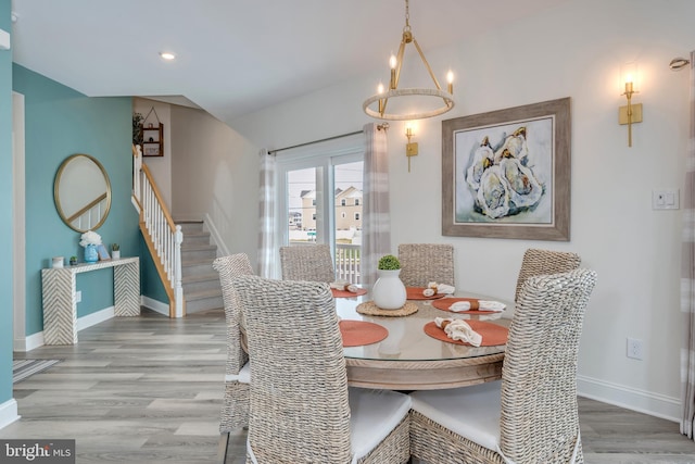 209 N New York Ave Unit 2, North Wildwood, NJ 08260 - dining space with wood finished floors, stairs, a chandelier, and recessed lighting