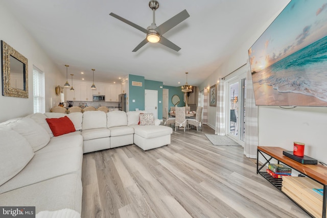 209 N New York Ave Unit 2, North Wildwood, NJ 08260 - living room with light wood-style floors, a ceiling fan, and recessed lighting