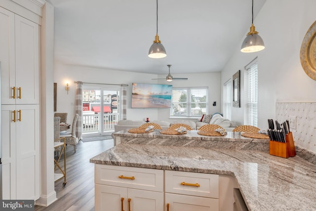 209 N New York Ave Unit 2, North Wildwood, NJ 08260 - kitchen featuring open floor plan, a ceiling fan, white cabinetry, and pendant lighting