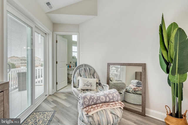 209 N New York Ave Unit 2, North Wildwood, NJ 08260 - sitting room featuring light wood-style flooring and vaulted ceiling