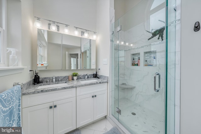 209 N New York Ave Unit 2, North Wildwood, NJ 08260 - bathroom featuring a marble finish shower, double vanity, and marble finish floors