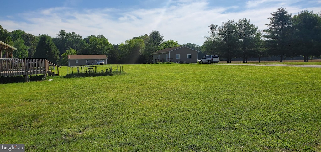 17439 Mill Branch Pl, Bowie, MD 20716 - view of green lawn with a deck