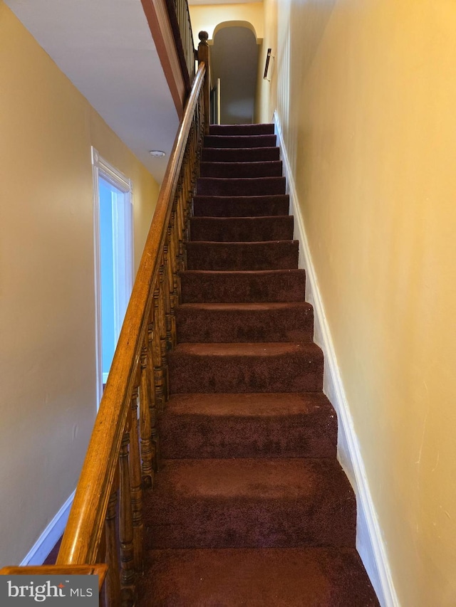 732 NW Morton St NW, Washington, DC 20010 - staircase featuring baseboards