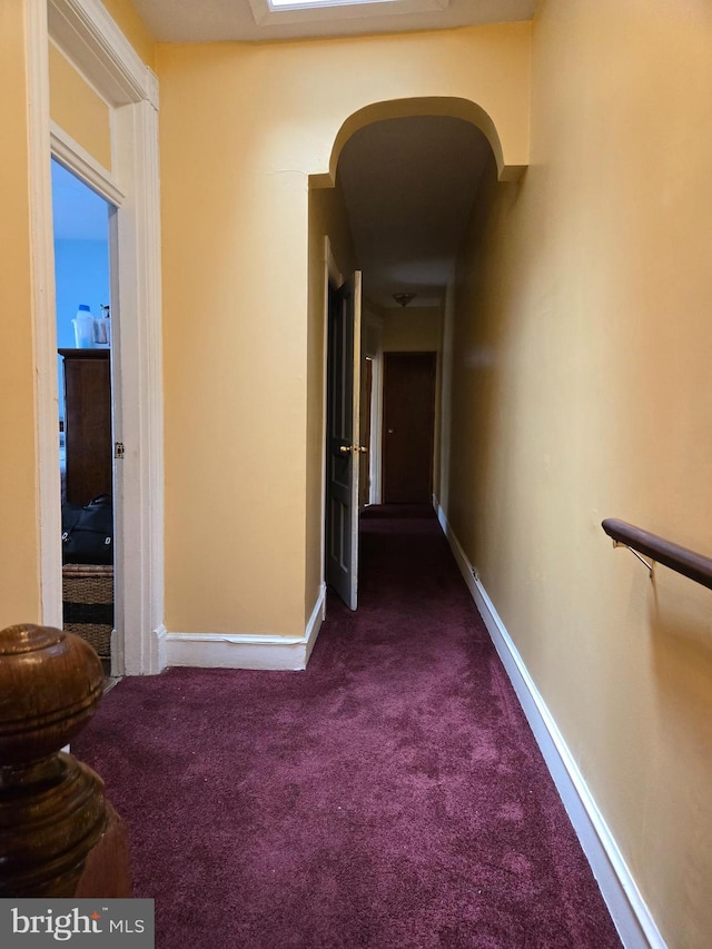 732 NW Morton St NW, Washington, DC 20010 - hallway with dark colored carpet and arched walkways