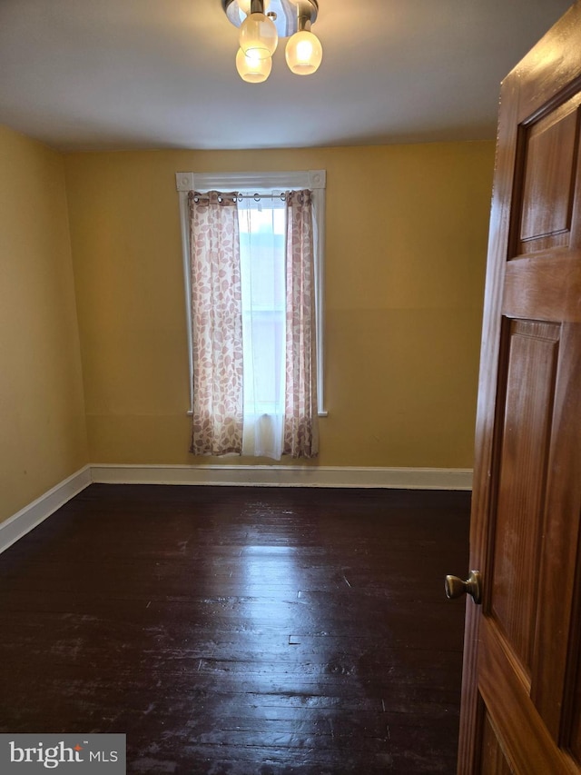 732 NW Morton St NW, Washington, DC 20010 - unfurnished room with a chandelier and hardwood / wood-style floors